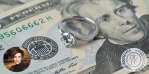 Diamond ring on money